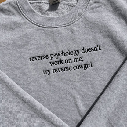Reverse Psychology Doesn't Work On Me Embroidered Sweatshirt